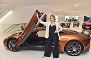 Viviane Geppert vor dem Jaguar C-X75 aus dem James Bond Film "Spectre" beim Grand Opening Jaguar Land Rover München Süd am 16.07.2019 Foto: BrauerPhotos / G. Nitschke für Jaguar Land Rover